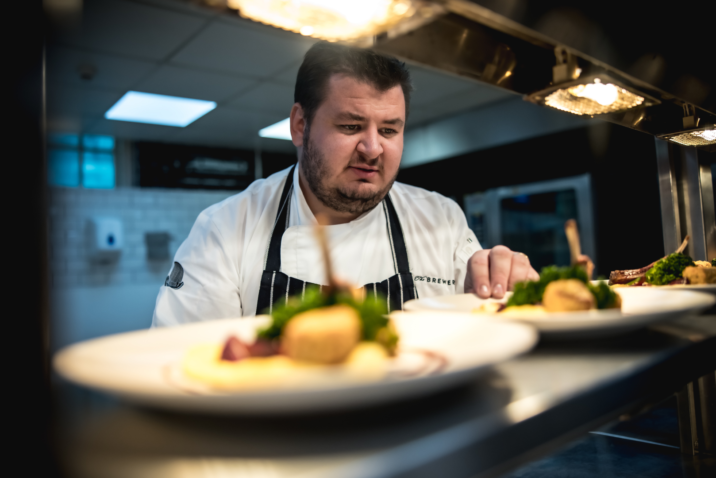 Chef Jack prepping food in the kitchen